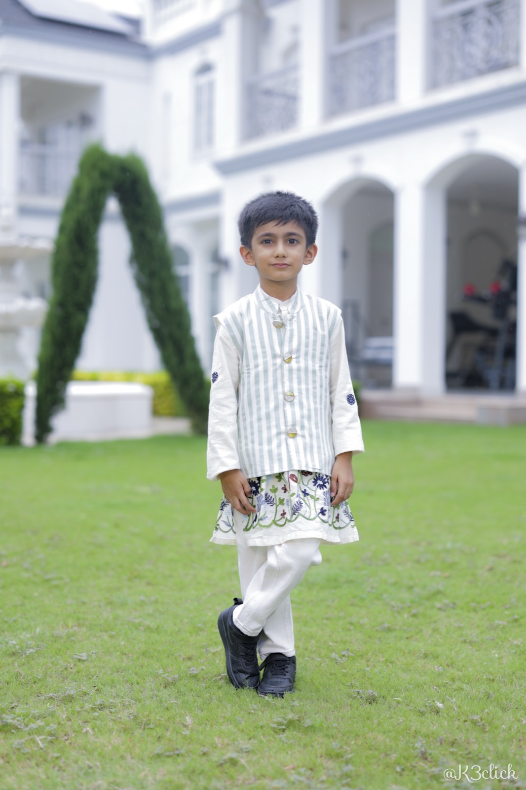 White kurta with striped nehru jacket